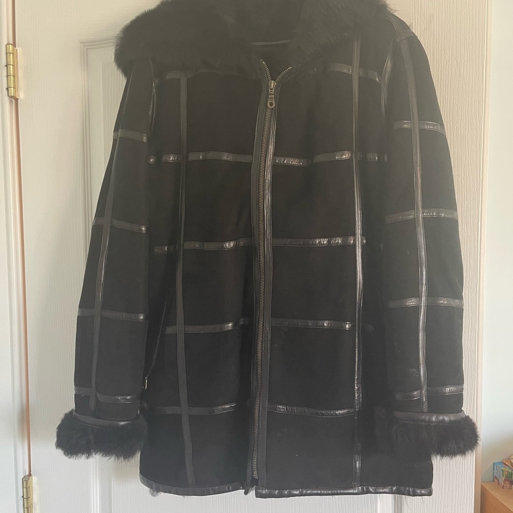 Like new fur leather jacket. Size medium. Made in Italy.